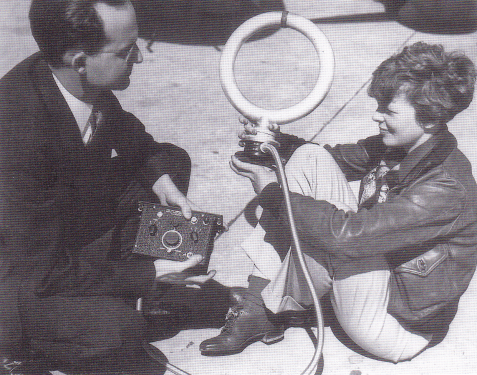 Amelia, with Bendix Corporation rep Cyril Remmlein, and the now-infamous direction finding loop that may or may not have failed her during the final flight. (photo courtesy Albert Bresnik, taken from "Earhart's Flight Into Yesterday.")